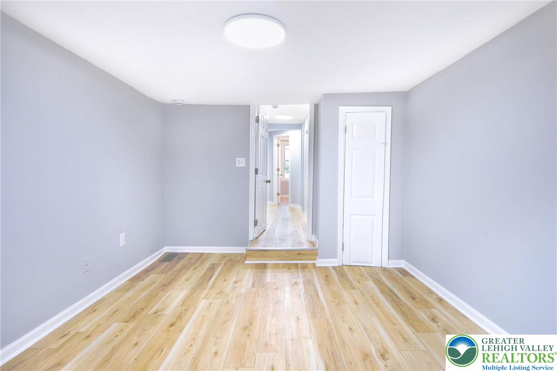910 Butler Street Easton, PA 18042 - Photo 14 of 29 a view of a room with wooden floor and white walls