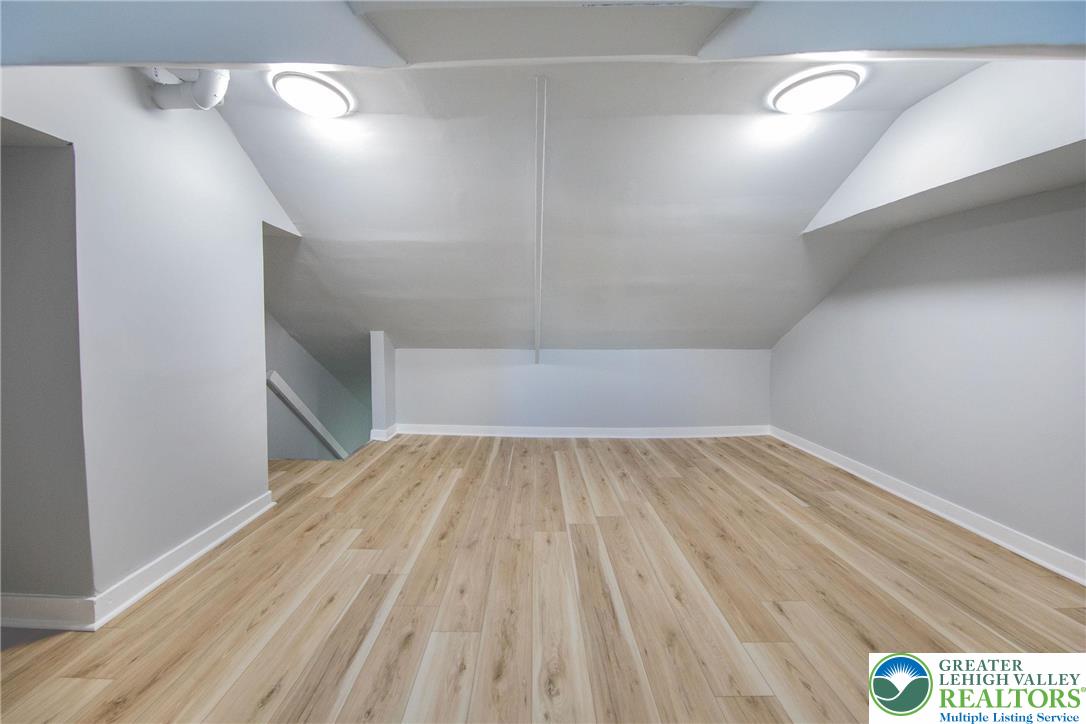 910 Butler Street Easton, PA 18042 - Photo 20 of 29 a view of empty room with wooden floor