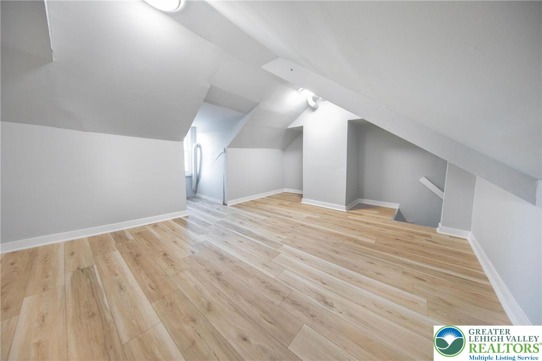 910 Butler Street Easton, PA 18042 - Photo 21 of 29 a view of a room with wooden floor