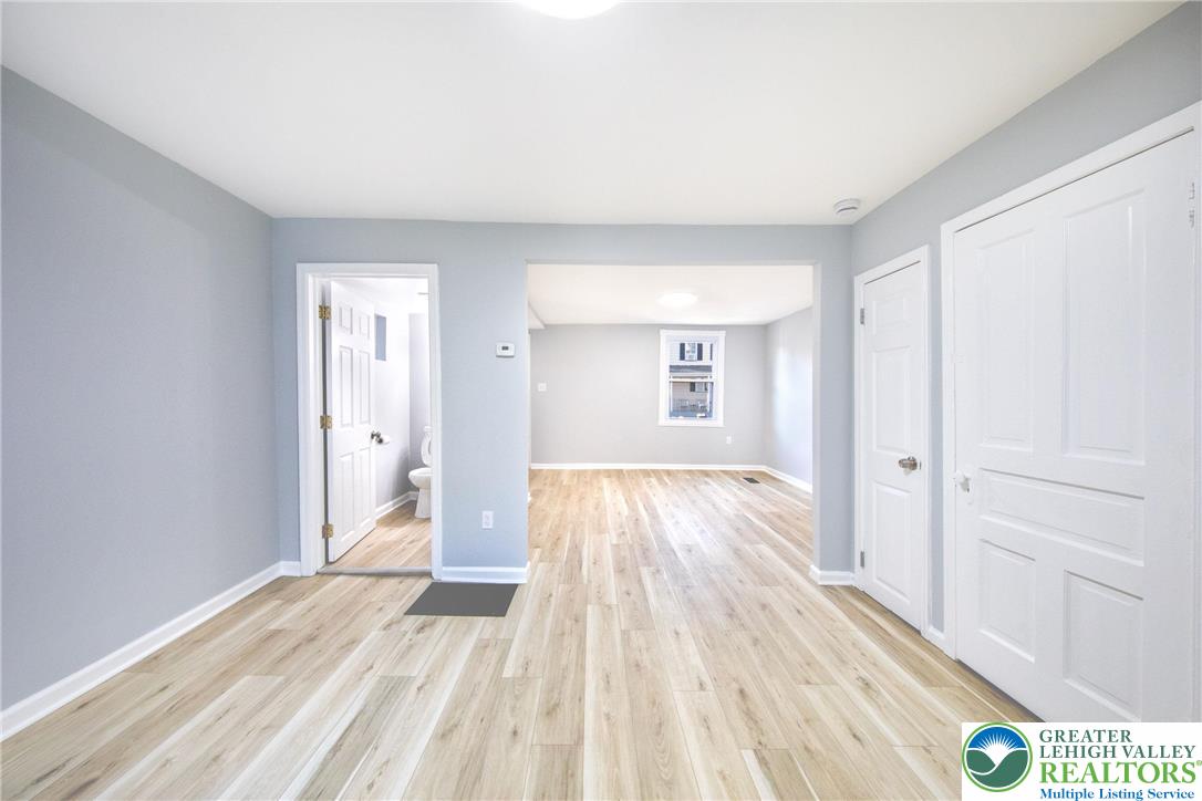 910 Butler Street Easton, PA 18042 - Photo 7 of 29 a view of a room with wooden floor and bathroom