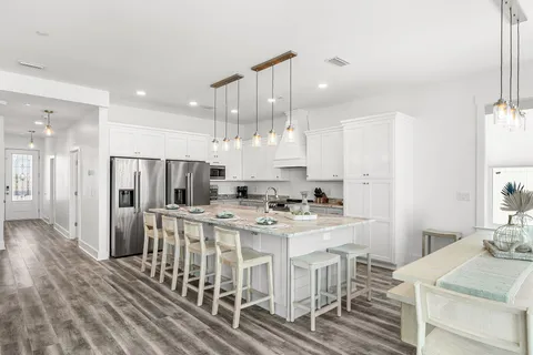 a dining room with granite countertop furniture and a fireplace