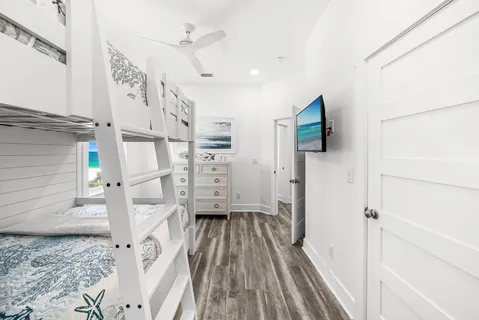 a bathroom with a shower and a sink