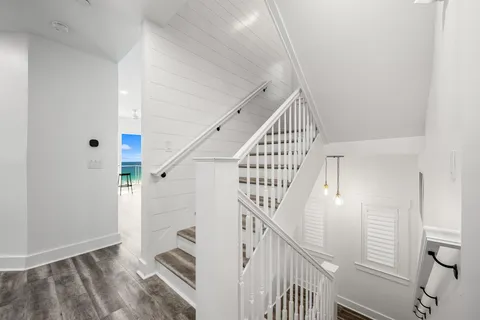 a view of a swimming pool with a lounge chair