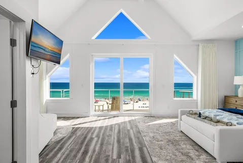 a view of a balcony with an ocean view
