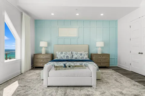 a view of a living room and floor to ceiling window or kitchen