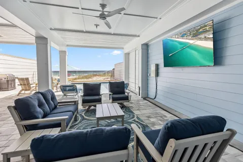 a spacious bedroom with a bed and a couch