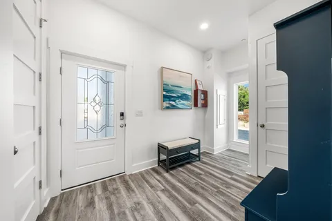 a living room with furniture and decor