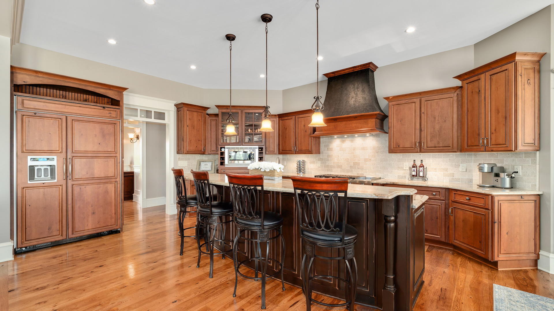44-w230 Scott Road Sugar Grove, IL 60554 - Photo 11 of 44 a kitchen with stainless steel appliances granite countertop wooden floors stove and cabinets