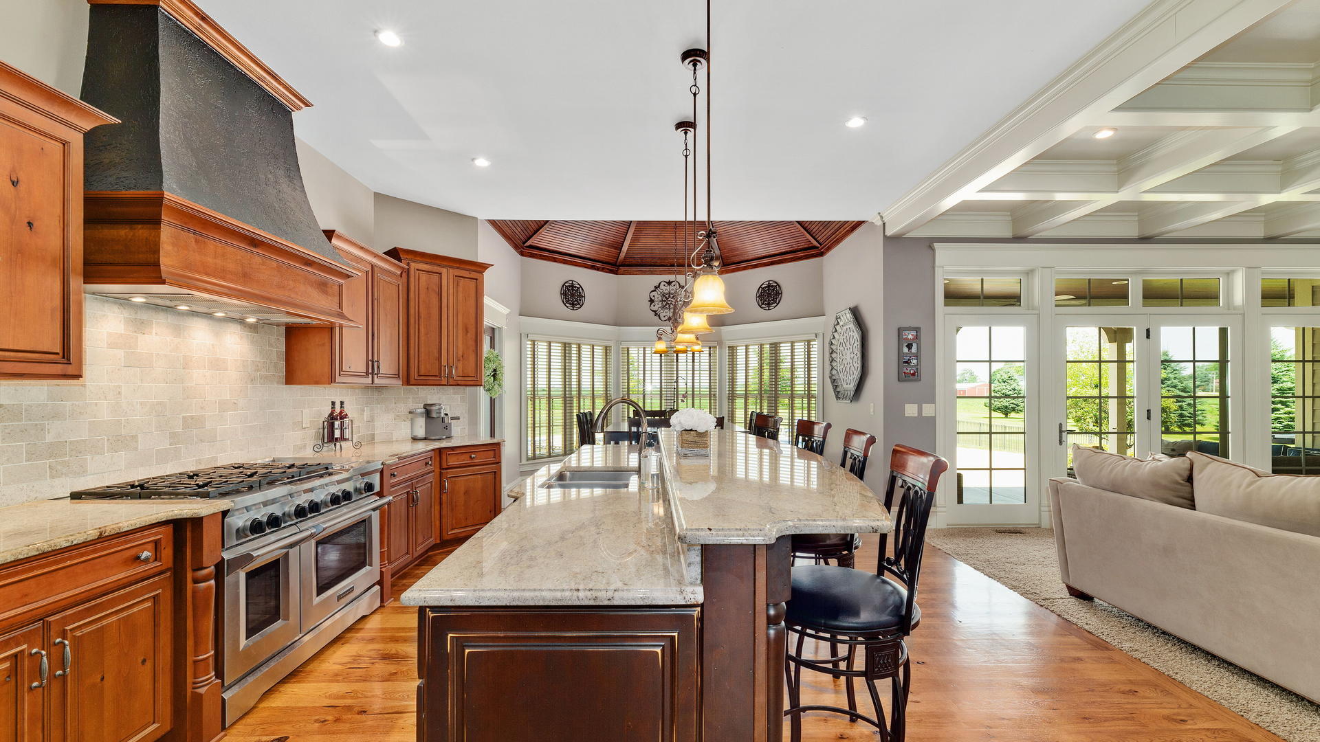 44-w230 Scott Road Sugar Grove, IL 60554 - Photo 14 of 44 a kitchen with stainless steel appliances granite countertop a stove top oven a dining table and chairs