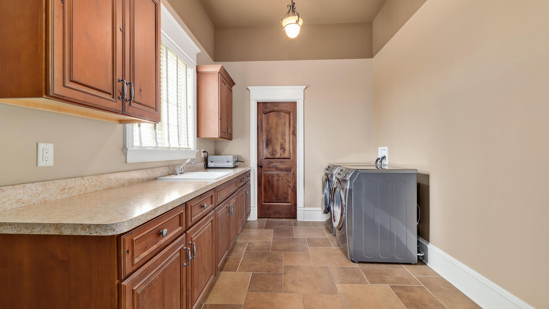 44-w230 Scott Road Sugar Grove, IL 60554 - Photo 16 of 44 a bathroom with a granite countertop sink and washing machine