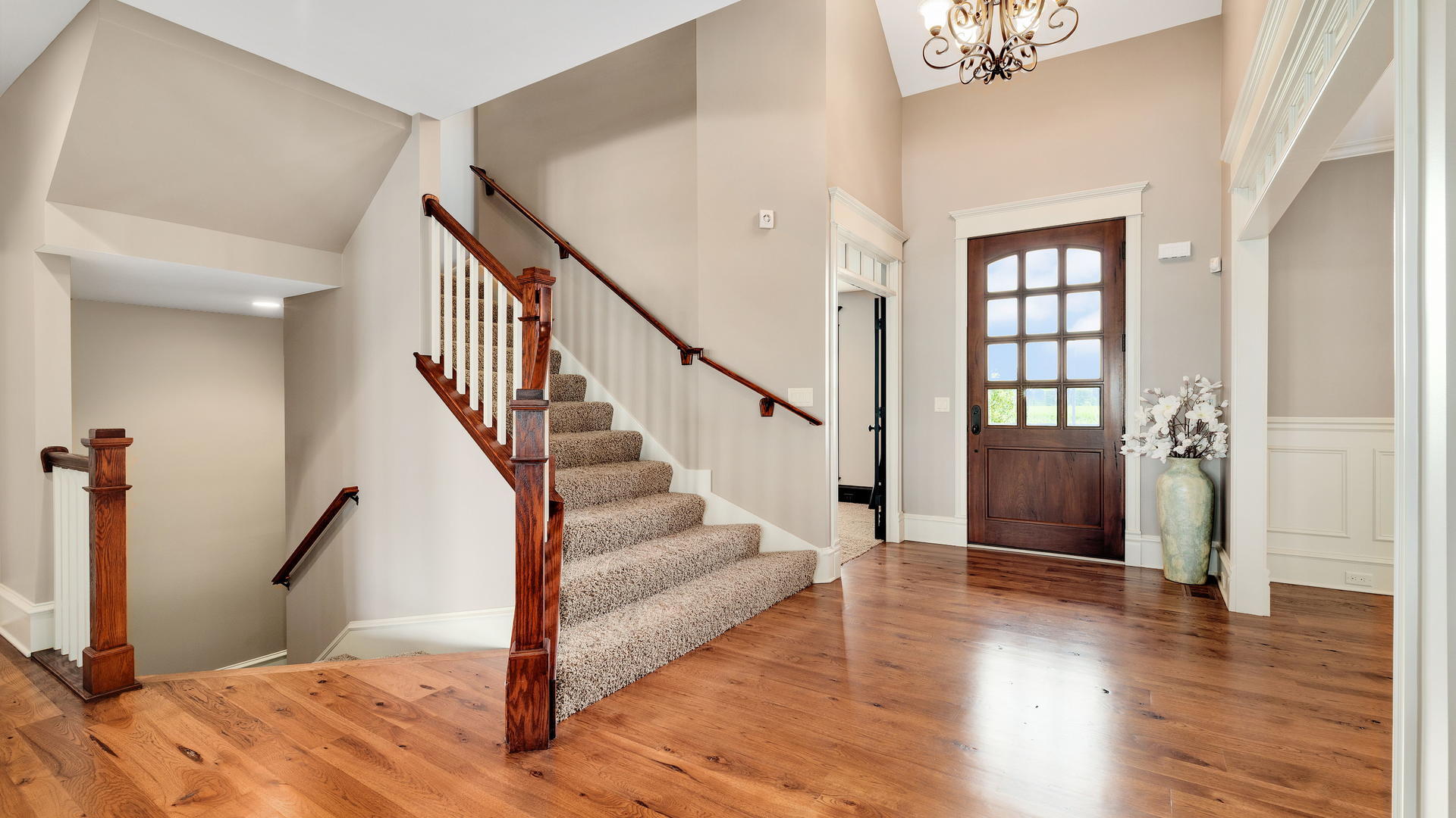44-w230 Scott Road Sugar Grove, IL 60554 - Photo 3 of 44 a view of an entryway with wooden floor and staircase