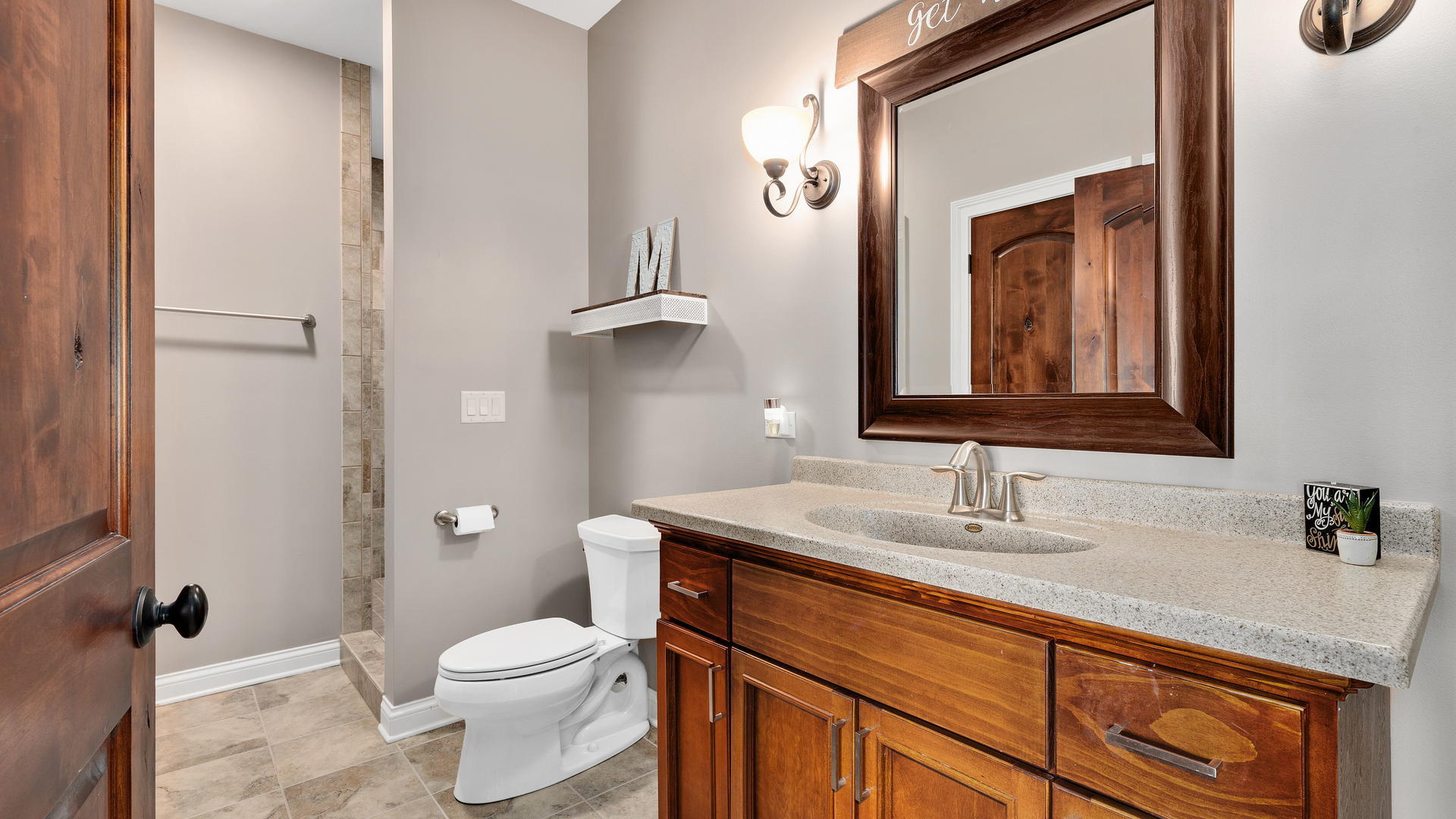 44-w230 Scott Road Sugar Grove, IL 60554 - Photo 27 of 44 a bathroom with a toilet sink and mirror