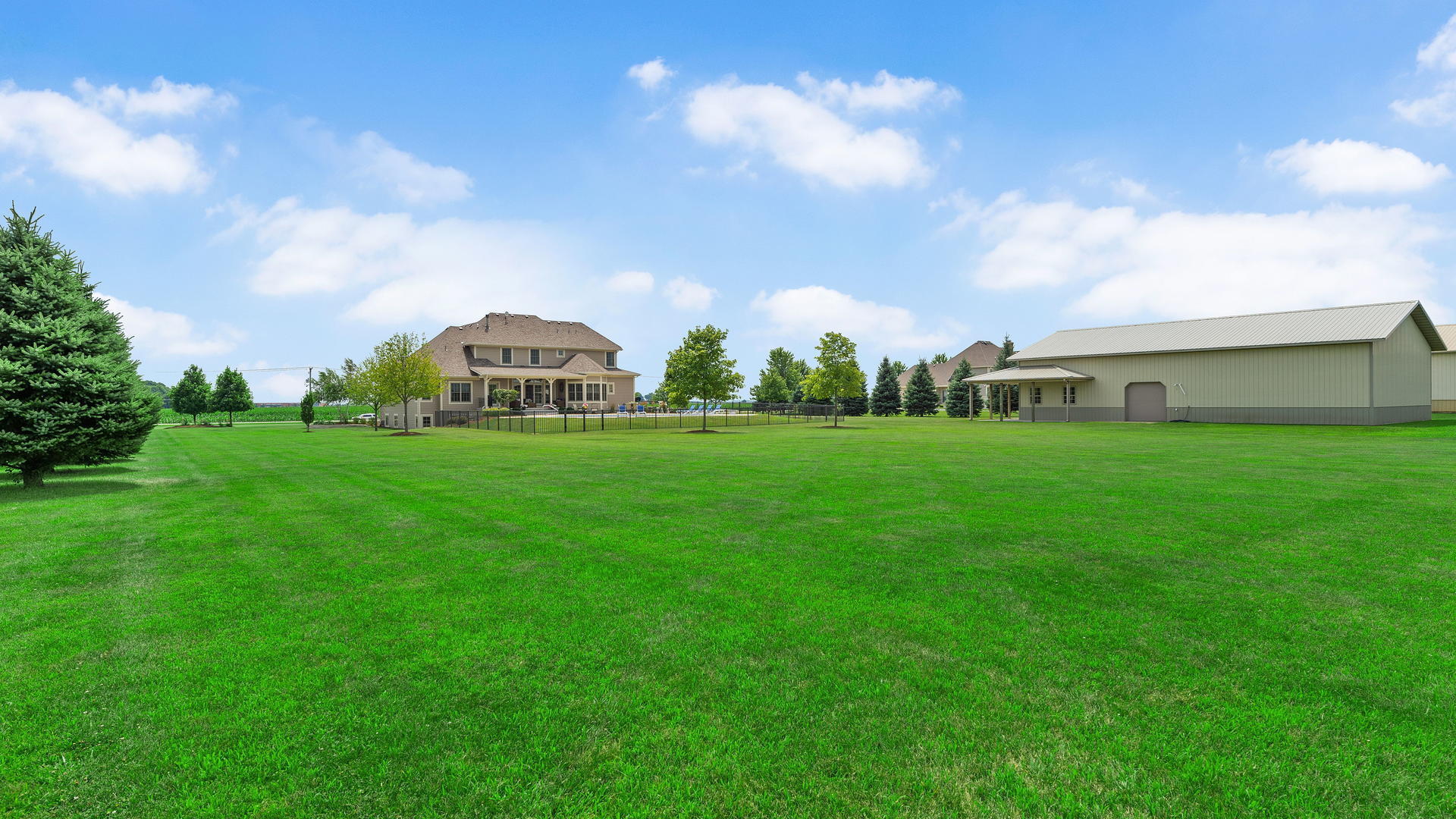44-w230 Scott Road Sugar Grove, IL 60554 - Photo 38 of 44 a view of a green field with house in the background