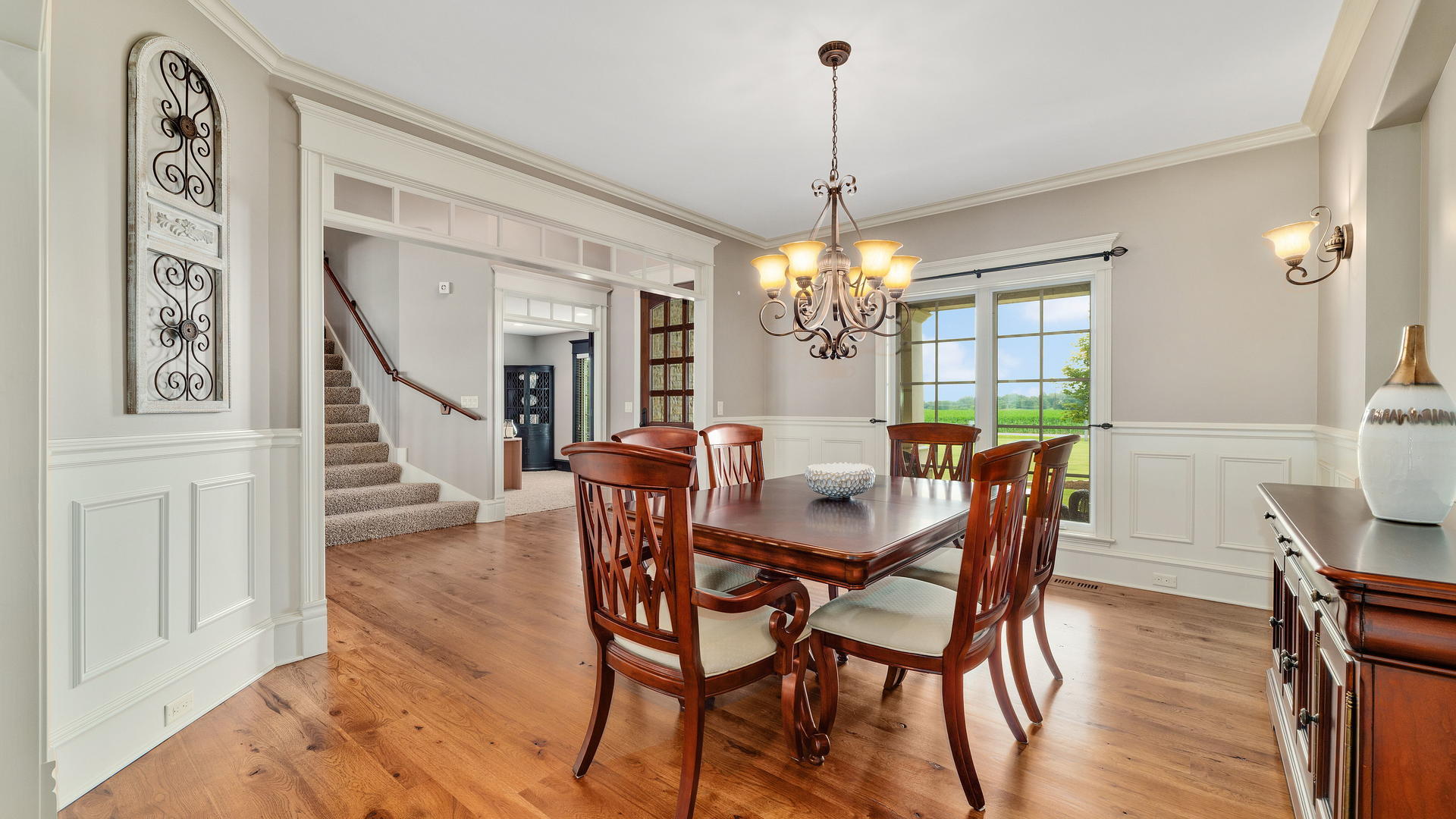 44-w230 Scott Road Sugar Grove, IL 60554 - Photo 5 of 44 a view of a dining room with furniture window and wooden floor