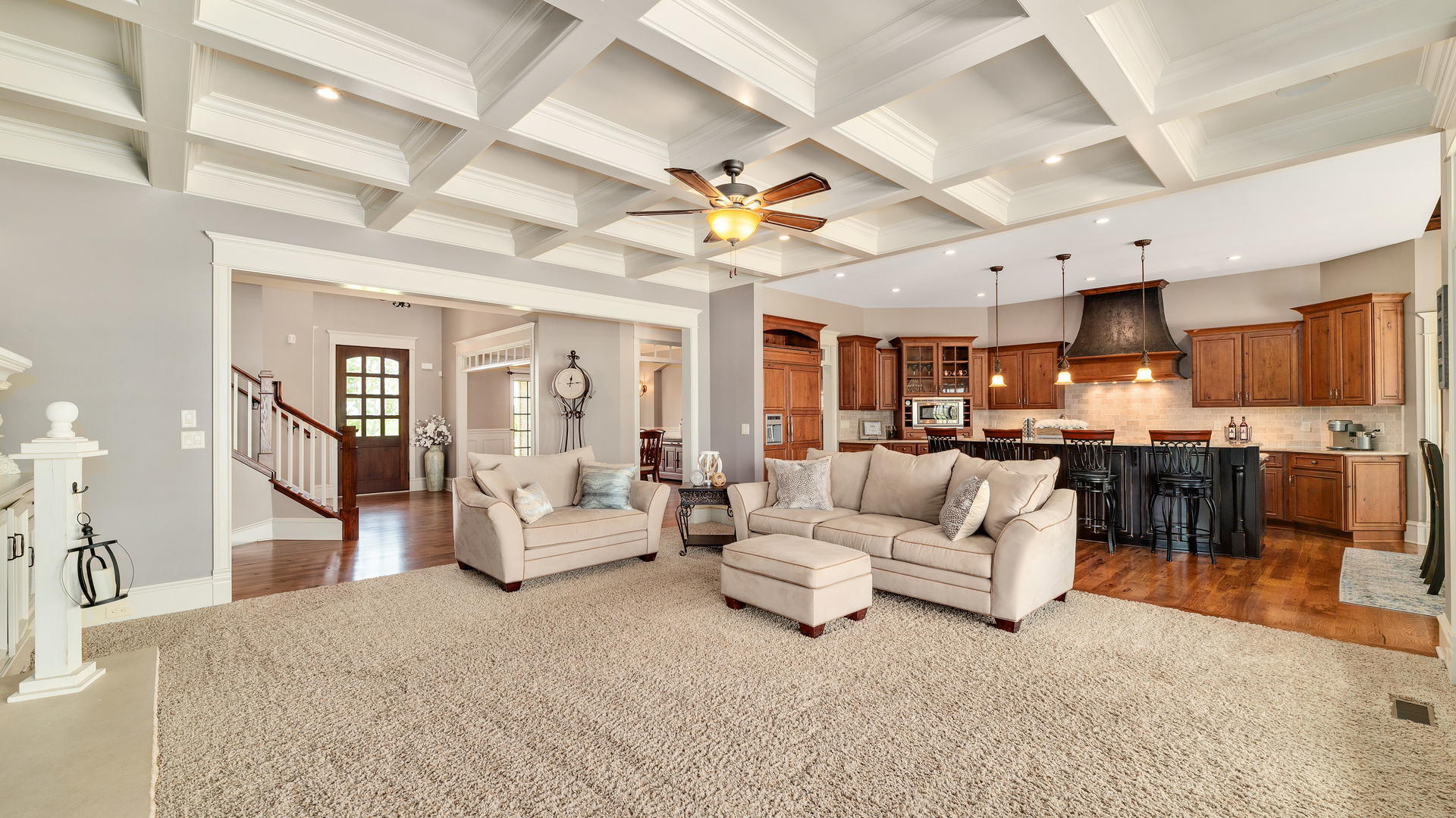 44-w230 Scott Road Sugar Grove, IL 60554 - Photo 6 of 44 a living room with furniture kitchen view and a chandelier
