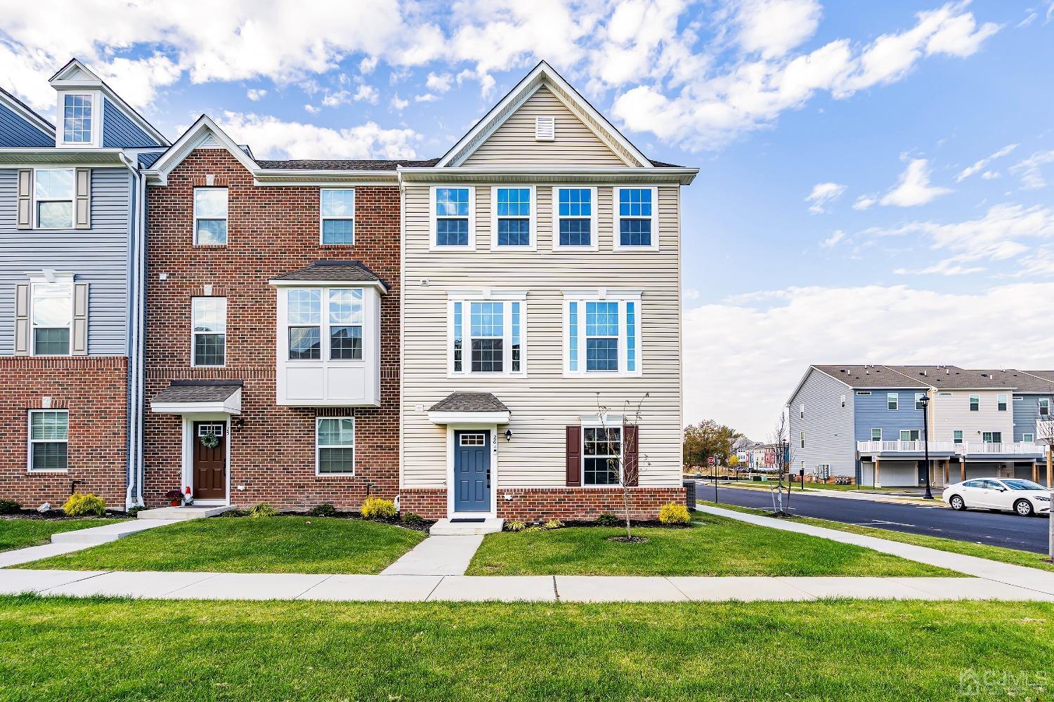 26 American Way Cliffwood, NJ 07721 - Photo 1 of 32 a front view of a house with a yard
