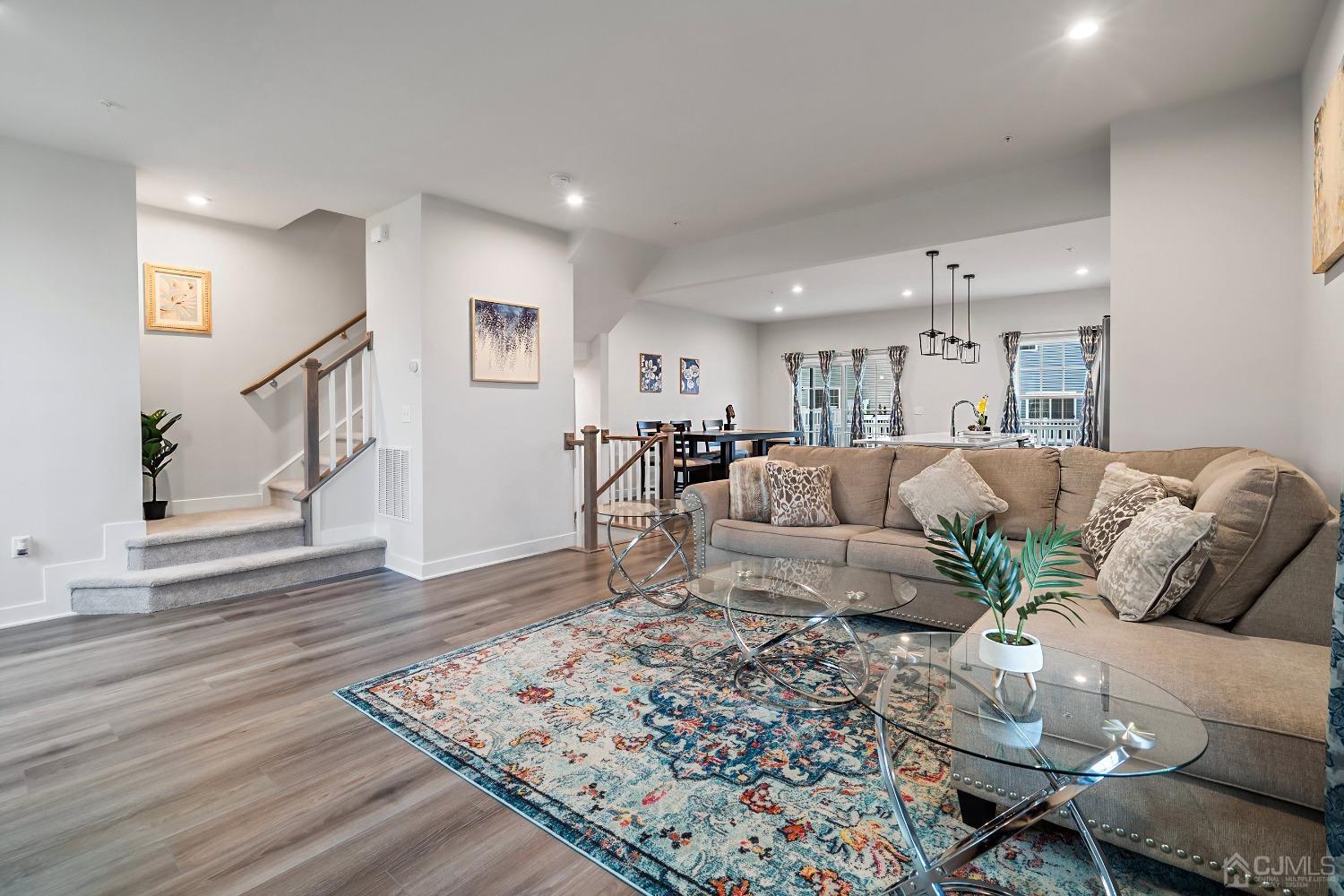 26 American Way Cliffwood, NJ 07721 - Photo 12 of 32 a living room with furniture and wooden floor