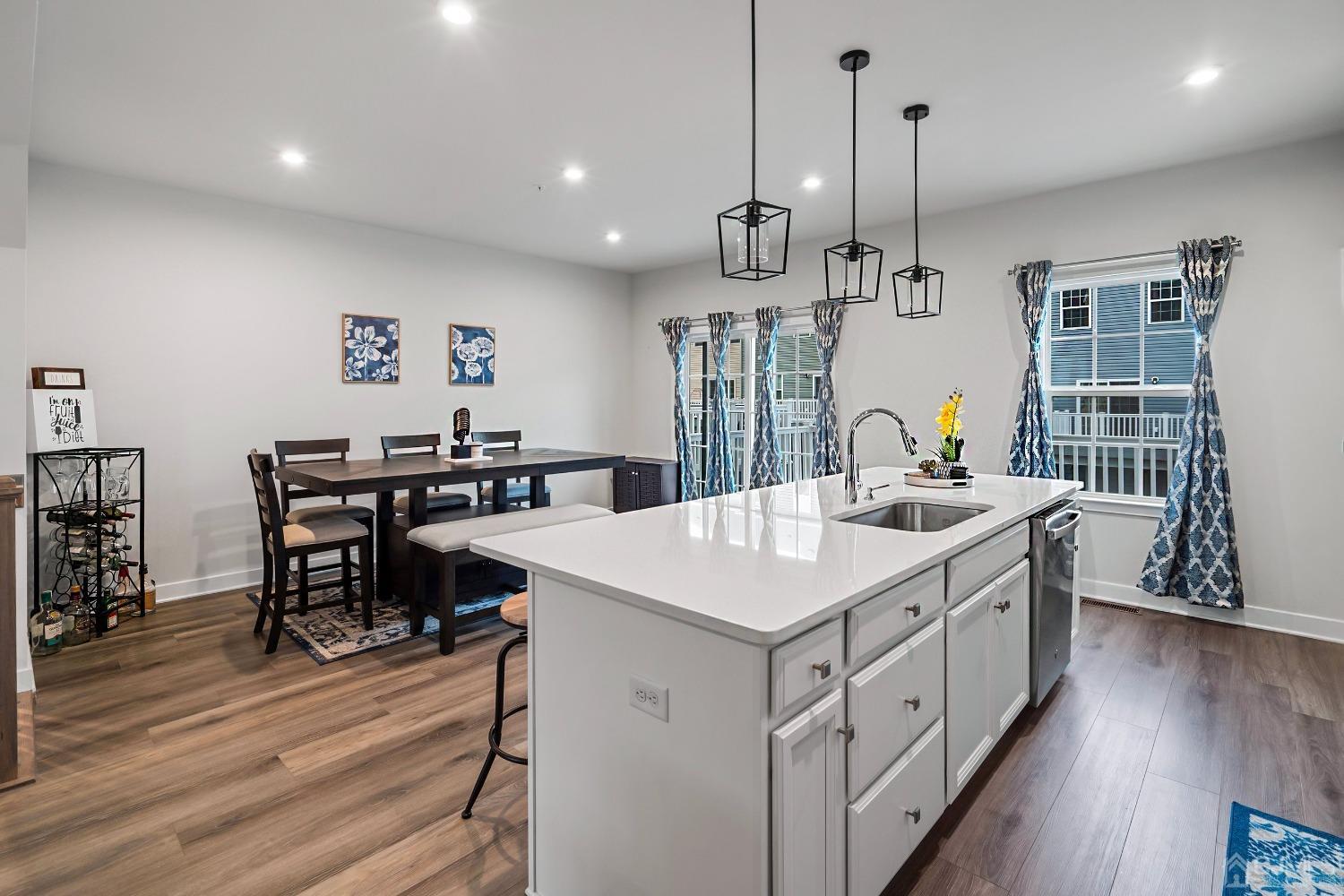 26 American Way Cliffwood, NJ 07721 - Photo 16 of 32 a large kitchen with stainless steel appliances kitchen island a large island in the center