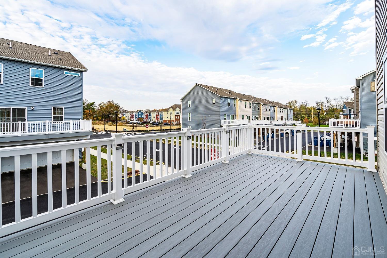 26 American Way Cliffwood, NJ 07721 - Photo 20 of 32 a view of a house with a deck
