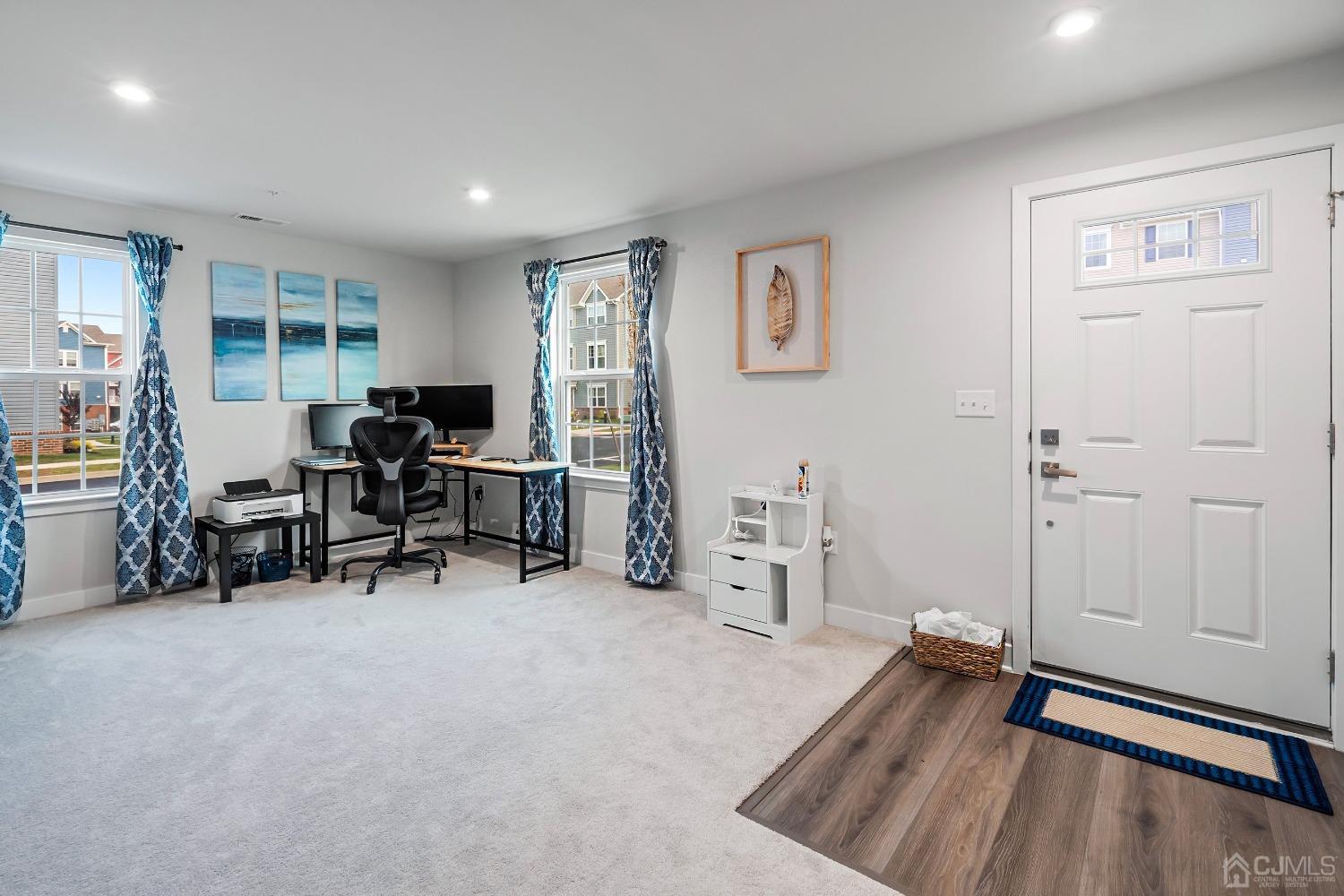 26 American Way Cliffwood, NJ 07721 - Photo 6 of 32 a view of a livingroom with workspace and a window