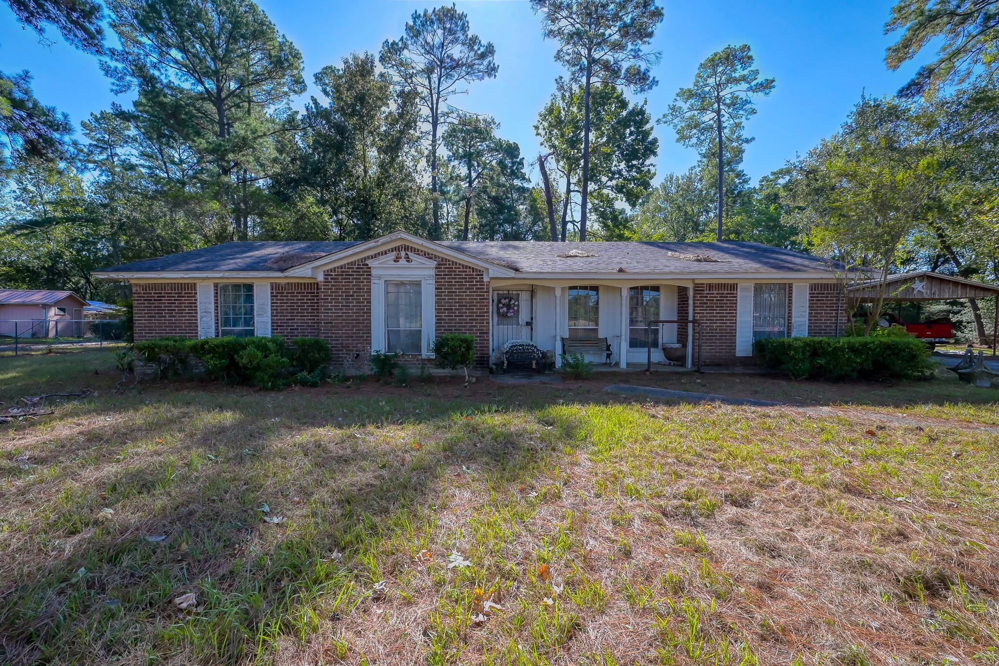 a front view of a house with swimming pool