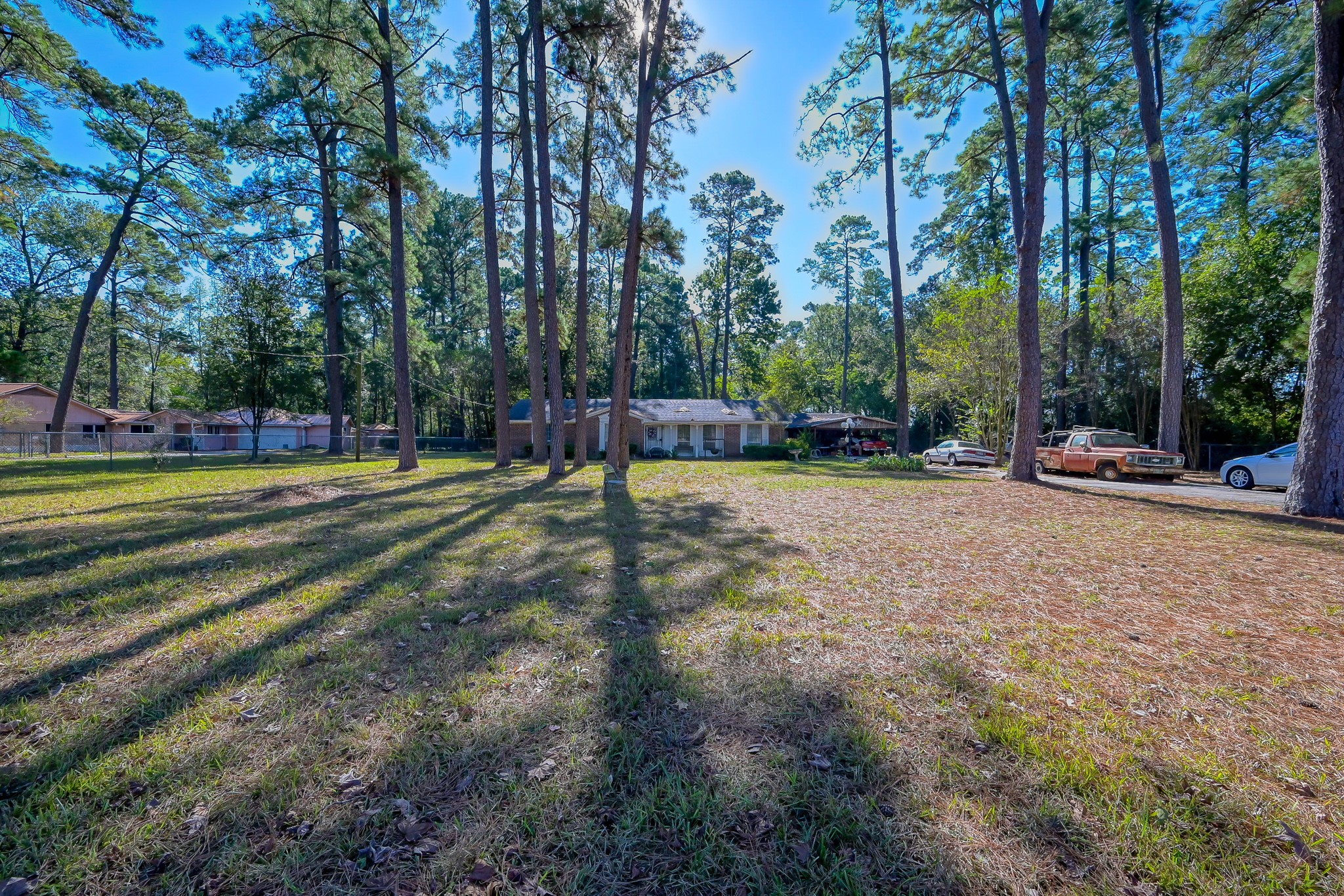 2104 Spring Creek Drive Spring, TX 77373 - Photo 3 of 9 a view of a park with swings and trees