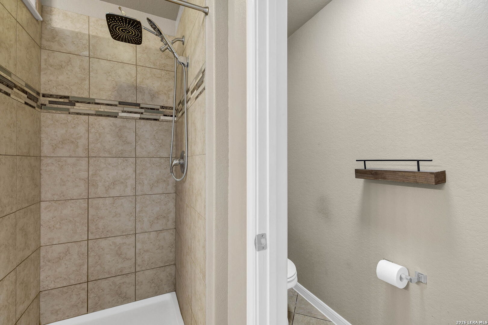 4015 Shervin Way Converse, TX 78109 - Photo 27 of 43 a bathroom with a shower