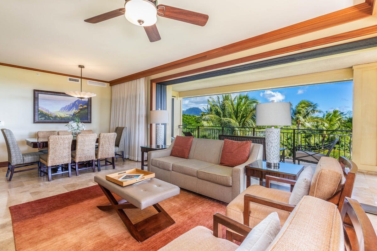 2641 Poipu Road, Unit 3201 Koloa, HI 96756 - Photo 5 of 12 a living room with furniture and a large window