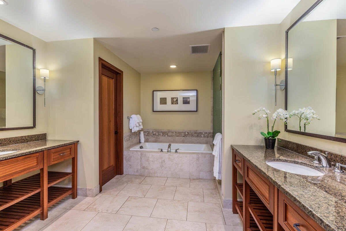 2641 Poipu Road, Unit 3201 Koloa, HI 96756 - Photo 8 of 12 a spacious bathroom with a granite countertop tub sink and mirror