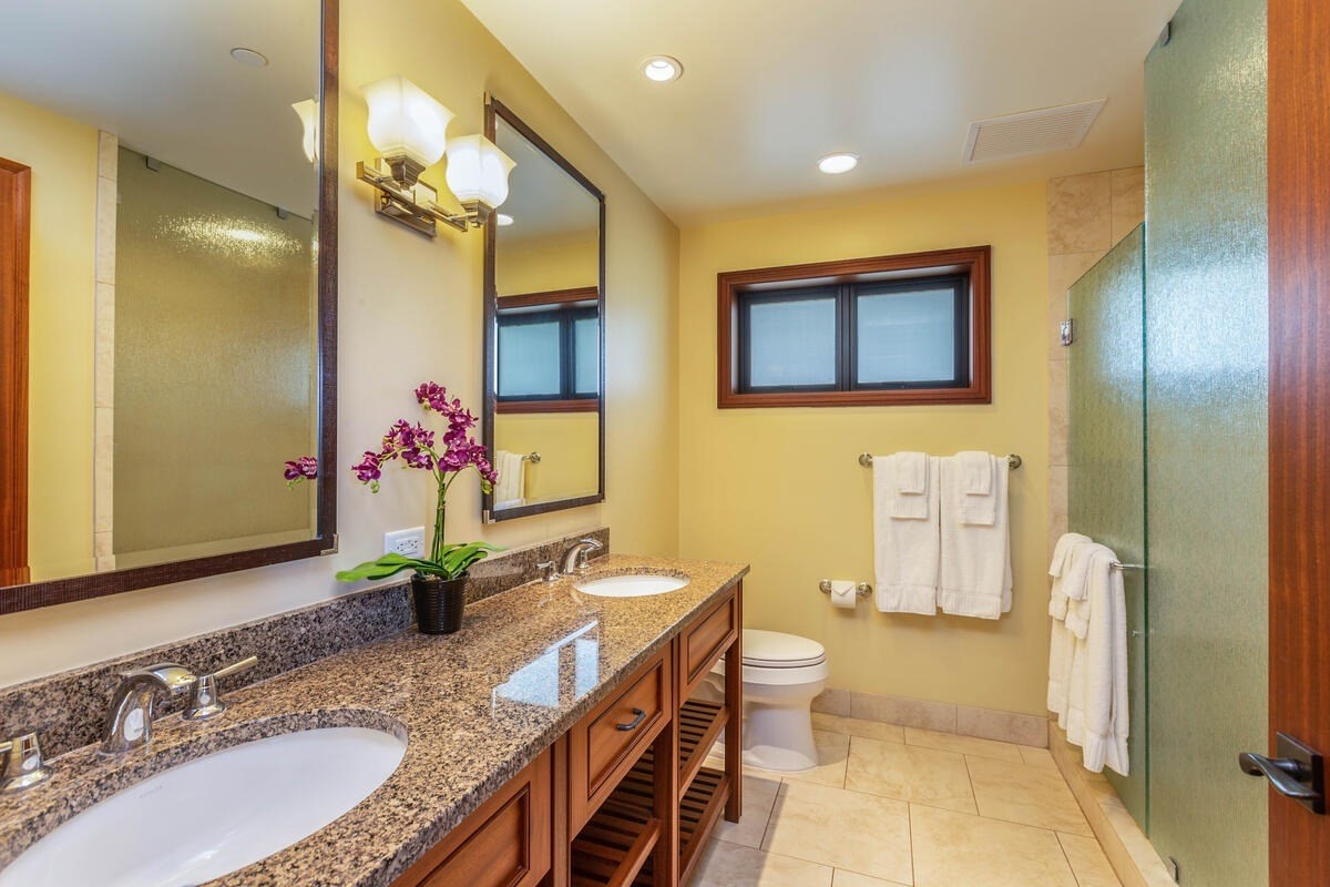 2641 Poipu Road, Unit 3201 Koloa, HI 96756 - Photo 10 of 12 a bathroom with a granite countertop sink and a mirror