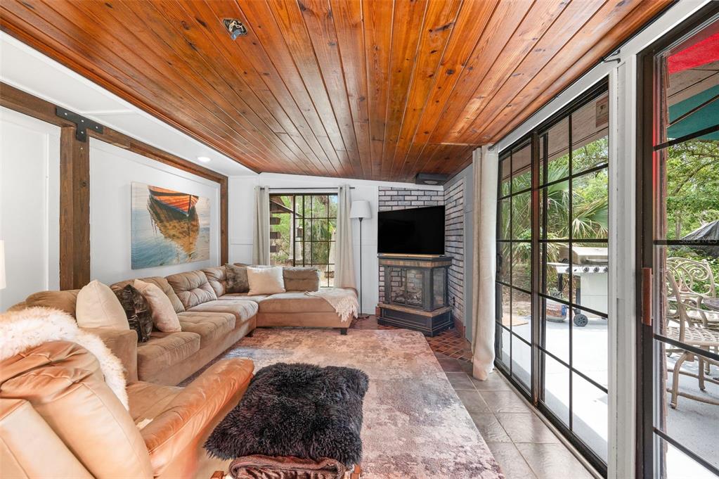 133 Seminole Trail Georgetown, FL 32139 - Photo 14 of 87 a living room with furniture and a flat screen tv
