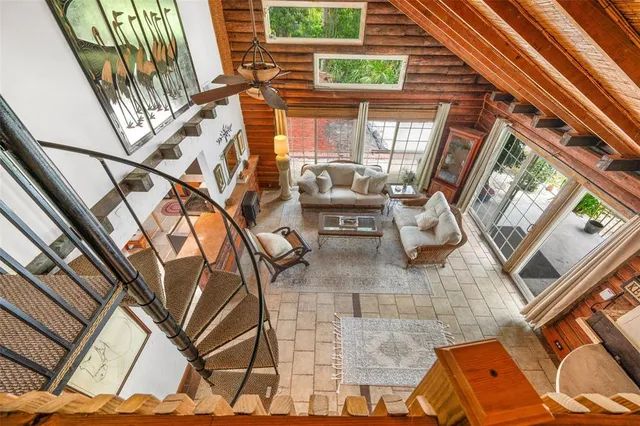 a view of backyard with seating space and garden