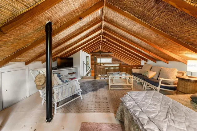 a view of a living room and floor to ceiling window