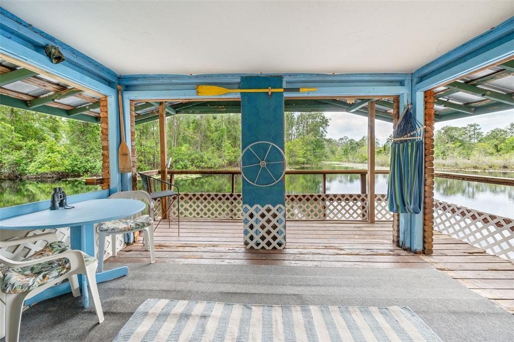 133 Seminole Trail Georgetown, FL 32139 - Photo 40 of 87 a view of a living room and floor to ceiling window