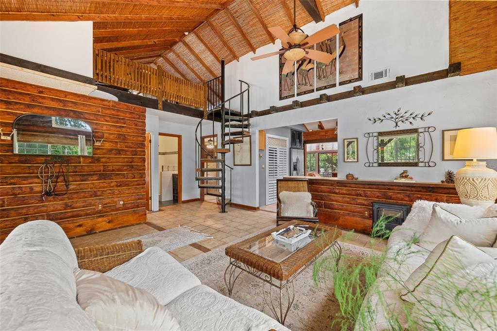 133 Seminole Trail Georgetown, FL 32139 - Photo 4 of 87 a backyard of a house with barbeque oven table and chairs