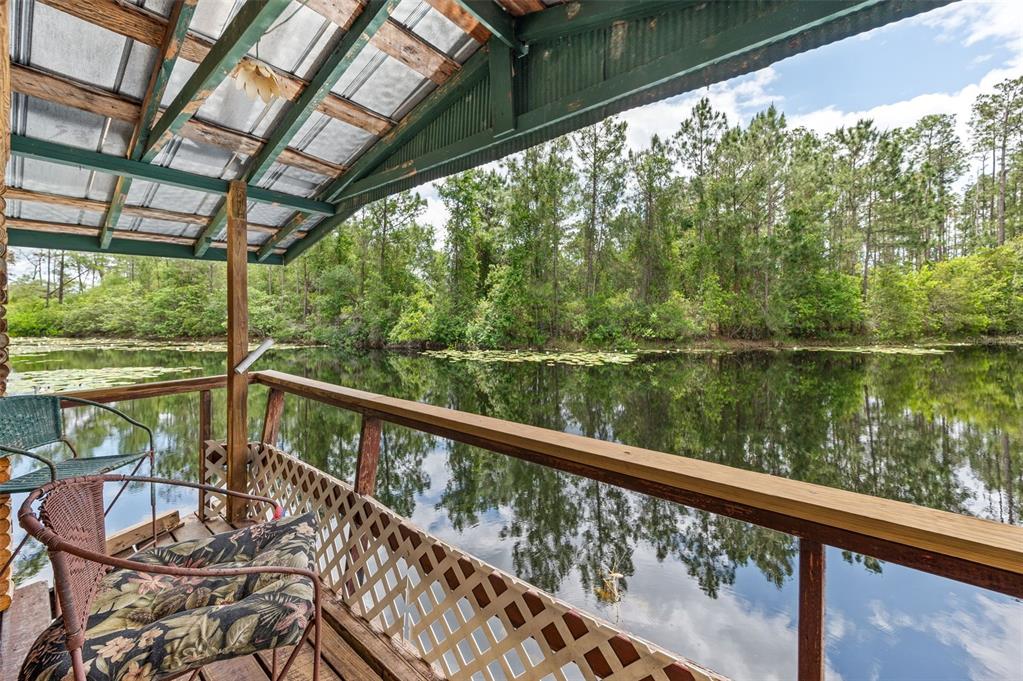 133 Seminole Trail Georgetown, FL 32139 - Photo 41 of 87 a view of a balcony with lake view