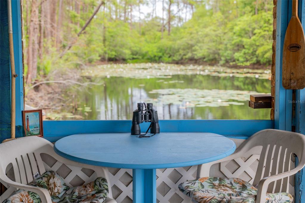 133 Seminole Trail Georgetown, FL 32139 - Photo 43 of 87 a view of a dining room with furniture and wooden floor
