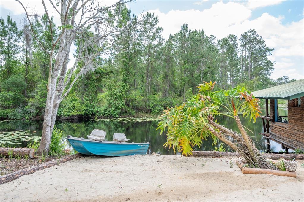133 Seminole Trail Georgetown, FL 32139 - Photo 45 of 87 a view of a backyard with plants and outdoor seating