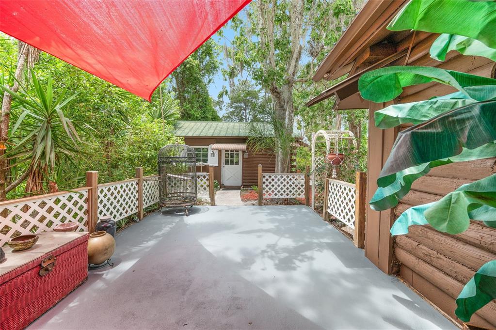 133 Seminole Trail Georgetown, FL 32139 - Photo 52 of 87 a view of a house with a small yard and deck