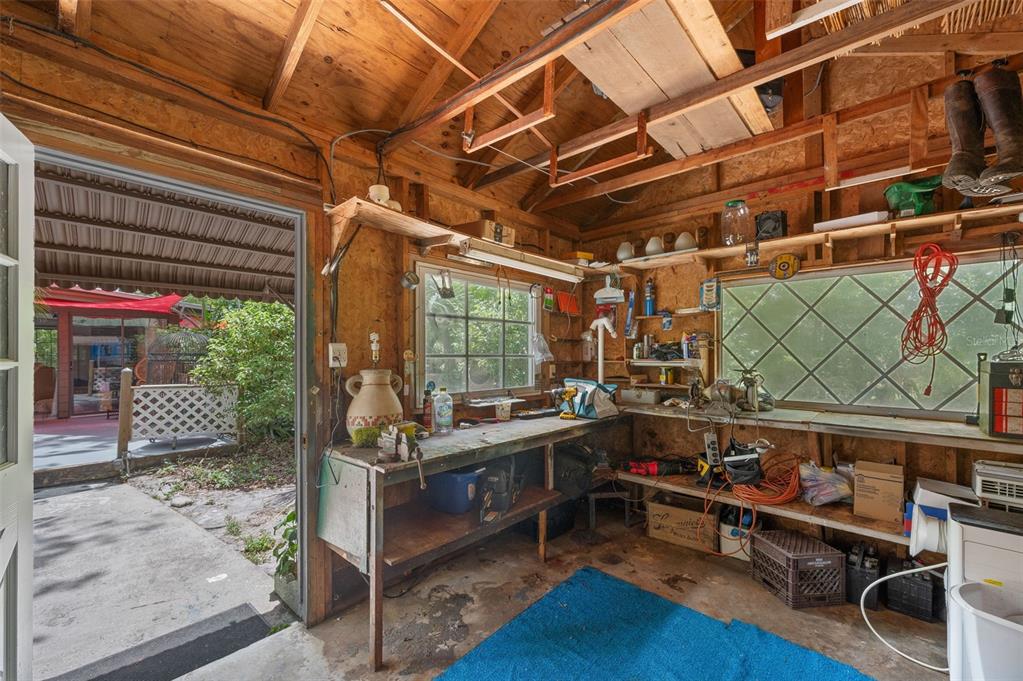 133 Seminole Trail Georgetown, FL 32139 - Photo 54 of 87 a room with wooden furniture and a window