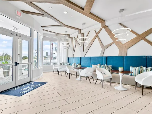 a room with gym equipment and mirrors