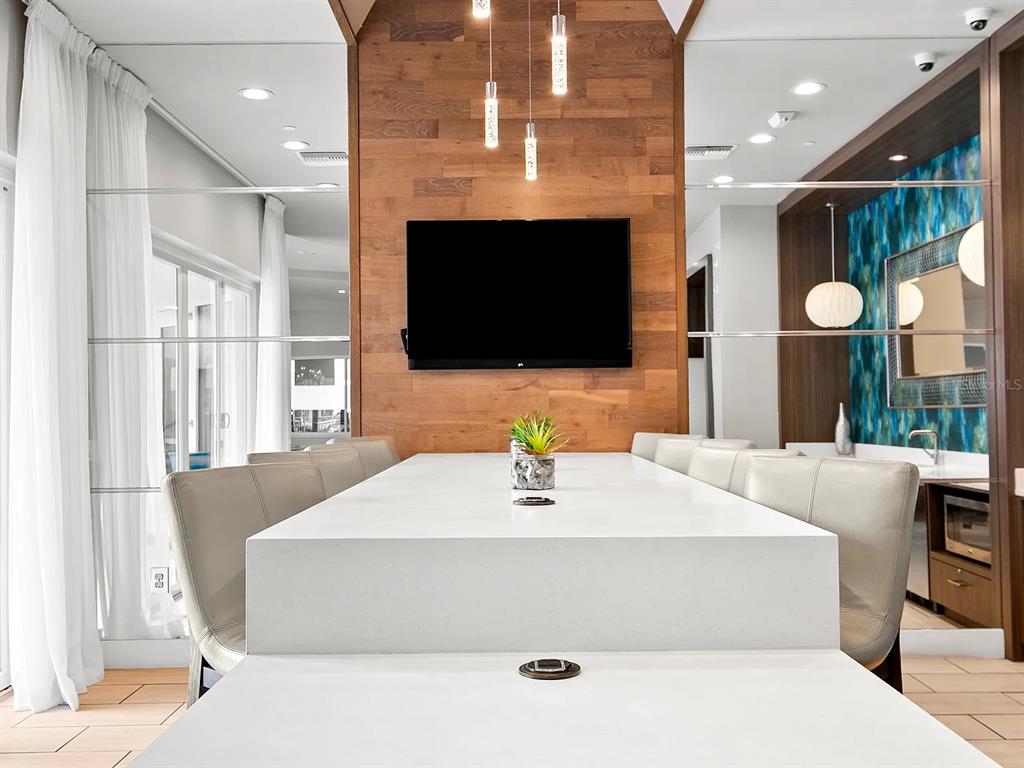 700 Cocoanut Avenue, Unit 331 Sarasota, FL 34236 - Photo 16 of 25 a bathroom with a sink a large mirror and a bathtub