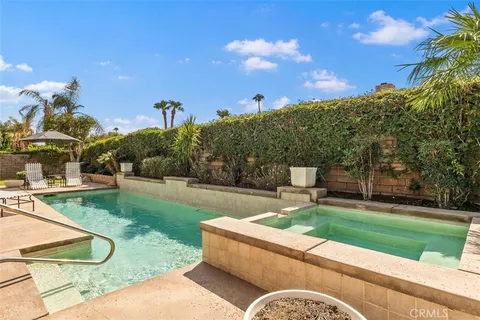 a garden view with a seating space