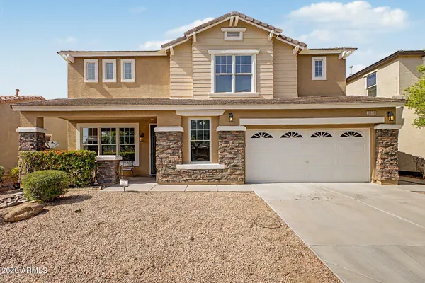 front view of a house with a yard