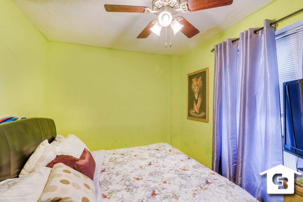 9 Argyle Road, Unit B3 Brooklyn, NY 11218 - Photo 6 of 10 a bedroom with a bed and wooden floor