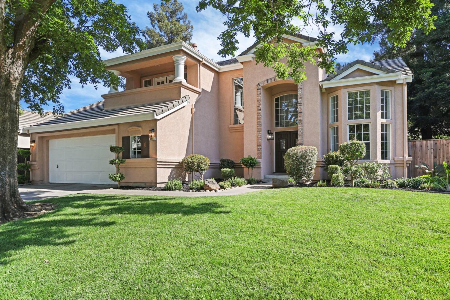 3395 Willowbrook Circle Stockton, CA 95219 - Photo 1 of 1 a front view of house with yard and green space