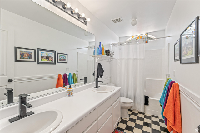 246 West Mount Charm Road Toquerville, UT 84774 - Photo 36 of 70 Full bath with light floors, double vanity, and shower / tub combo