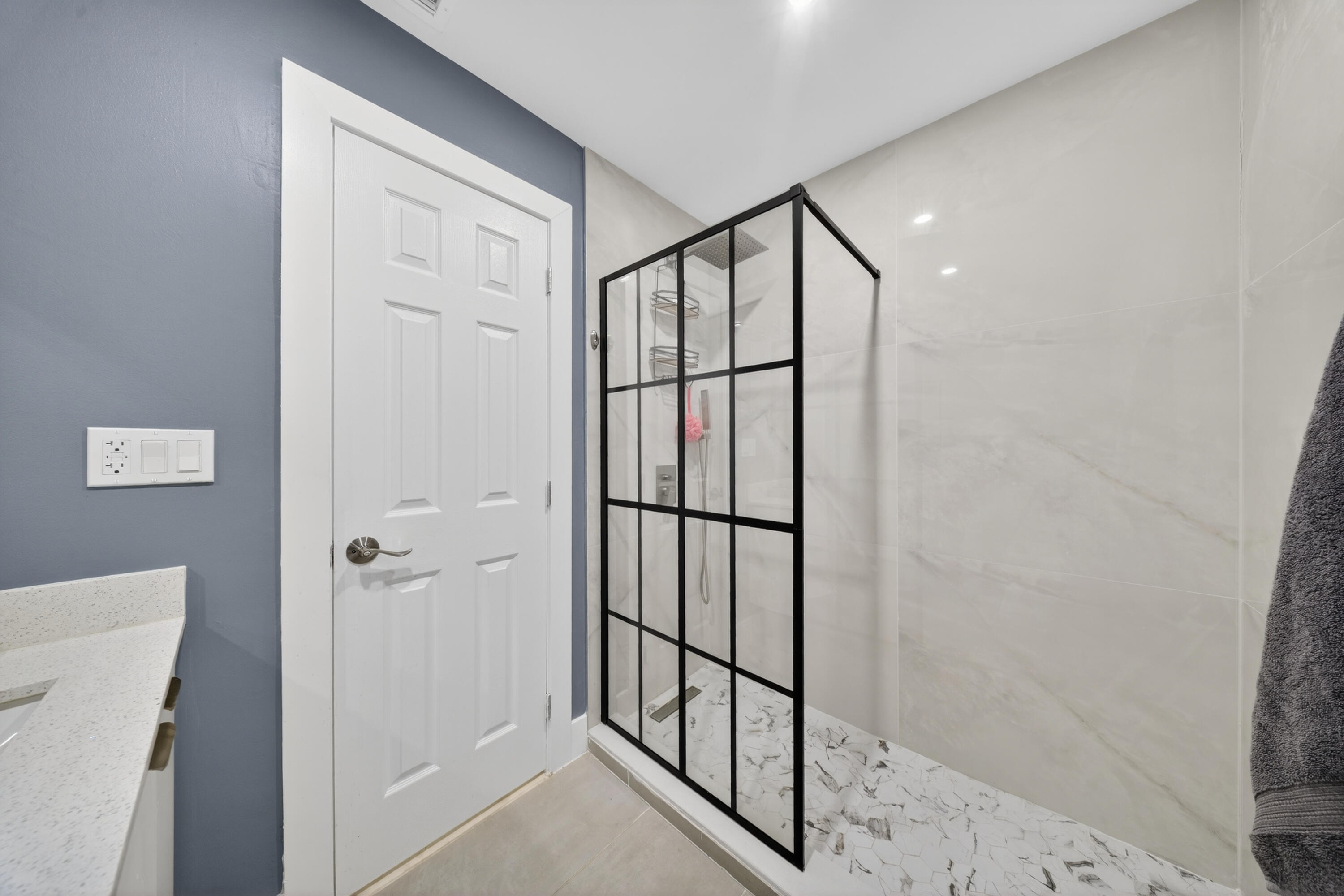 801 Southeast 15th Street Stuart, FL 34994 - Photo 14 of 25 a bathroom with a shower and a toilet