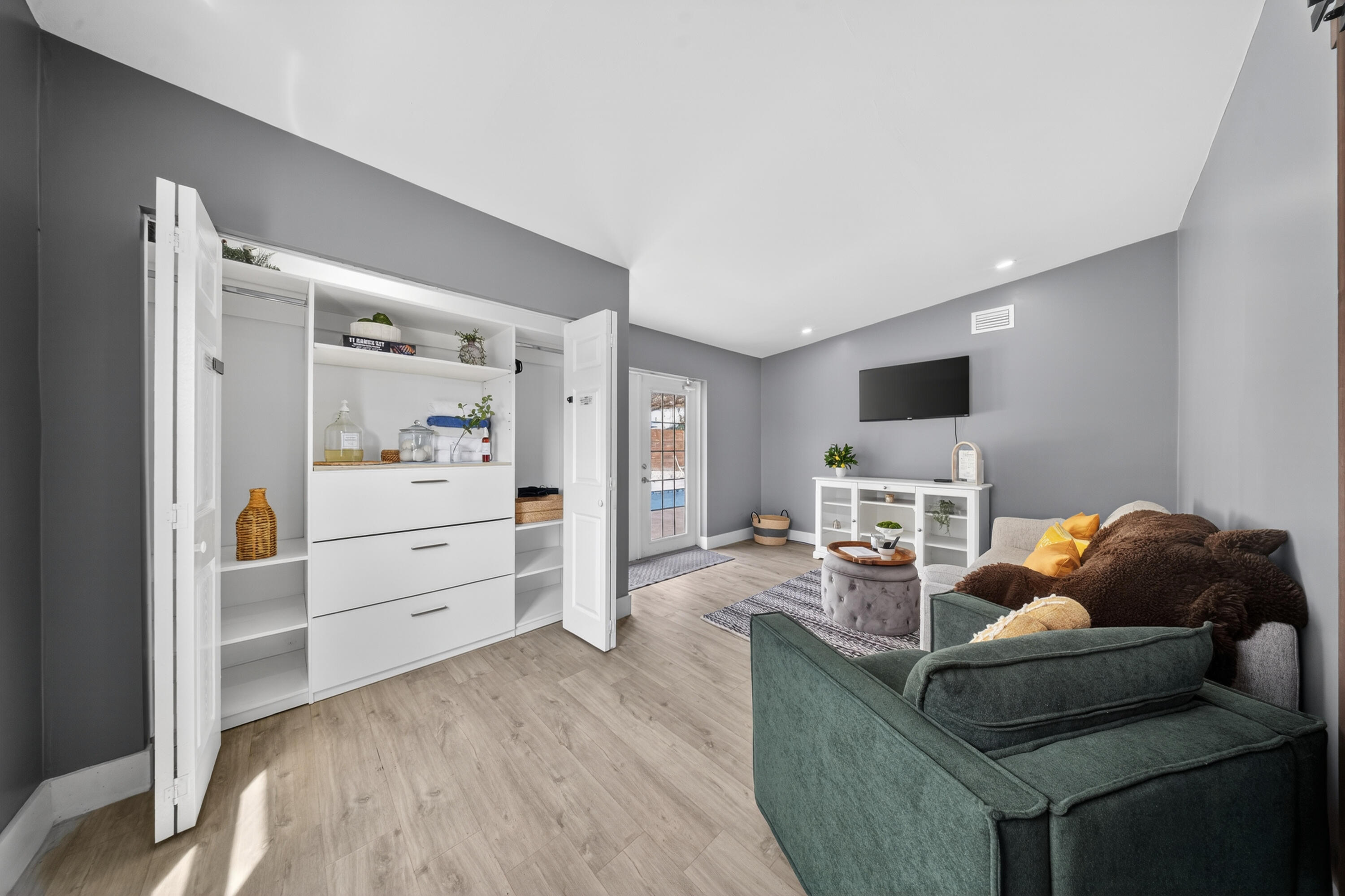 801 Southeast 15th Street Stuart, FL 34994 - Photo 19 of 25 a living room with furniture and a flat screen tv