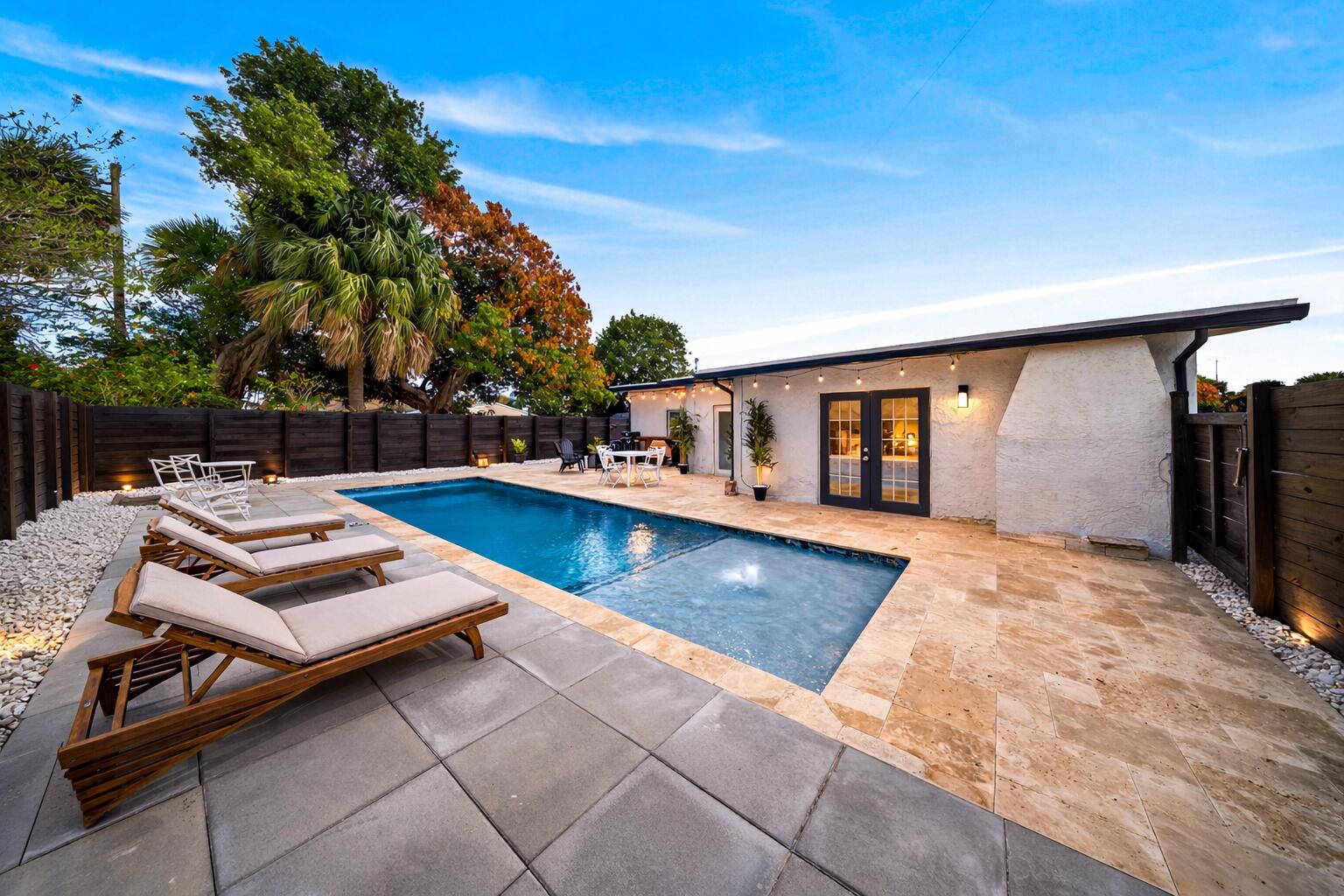801 Southeast 15th Street Stuart, FL 34994 - Photo 20 of 25 a view of a swimming pool with lounge chair
